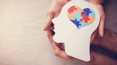 puzzle jigsaw heart on brain,  mental health concept, world autism awareness day